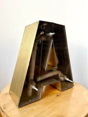 Vintage brass shop sign letter A from France, mid 20th century