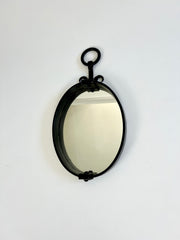 Brutalist mid-century oval wall mirror
