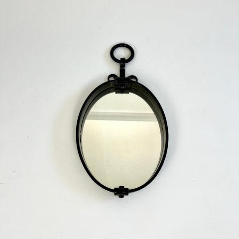 Brutalist mid-century oval wall mirror