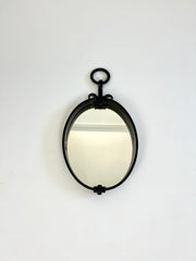 Brutalist mid-century oval wall mirror