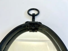 Brutalist mid-century oval wall mirror