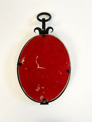 Brutalist mid-century oval wall mirror