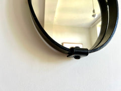Brutalist mid-century oval wall mirror