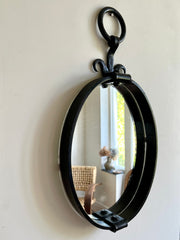 Brutalist mid-century oval wall mirror