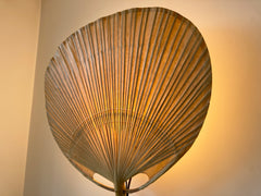 Uchiwa fan wall light designed in the 1970s by Ingo Maurer for his Munich based lighting design company, Design M.