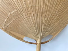 Uchiwa fan wall light designed in the 1970s by Ingo Maurer for his Munich based lighting design company, Design M.
