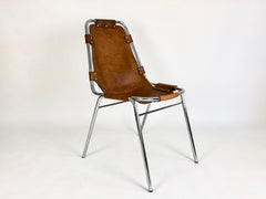Leather chairs selected by Charlotte Perriand for Les Arcs