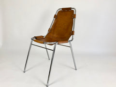 Leather chairs selected by Charlotte Perriand for Les Arcs