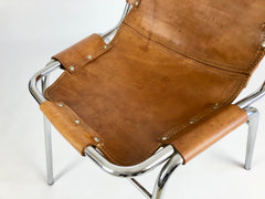 Leather chairs selected by Charlotte Perriand for Les Arcs