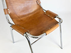 Leather chairs selected by Charlotte Perriand for Les Arcs