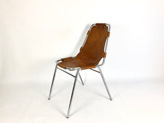 Leather chairs selected by Charlotte Perriand for Les Arcs