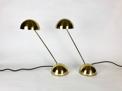 Pair of lights in brass, designed by Barbieri and Marianelli for Tronconi Illuminazione, Italy. Dated 1981.