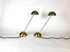 Pair of lights in brass, designed by Barbieri and Marianelli for Tronconi Illuminazione, Italy. Dated 1981.