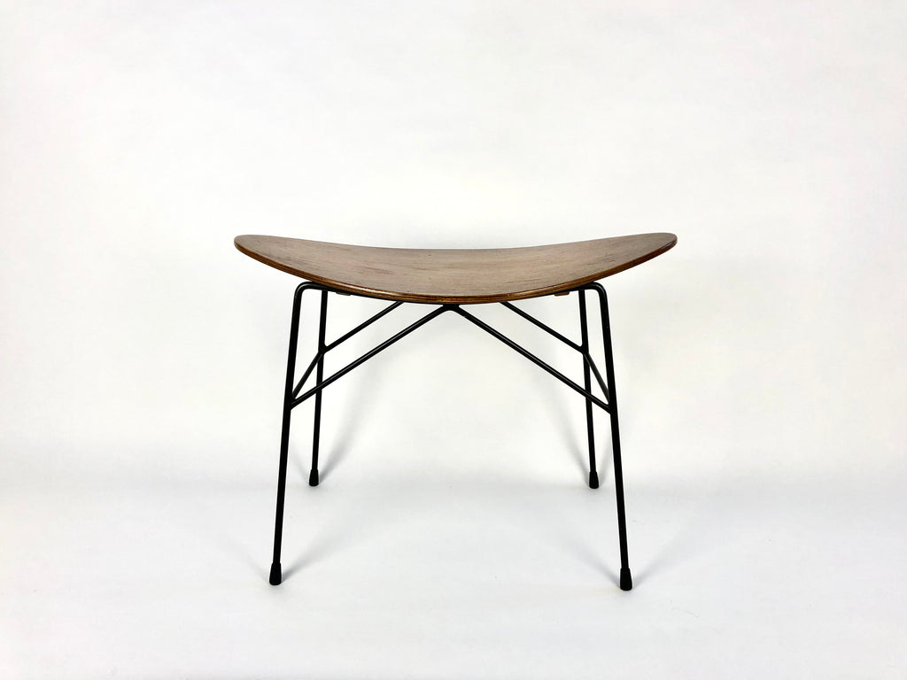 Rare Italian stool by Mobili Pizzetti, late 50s/early 60s.  Beautifully shaped curved teak bent ply seat on black lacquered base.