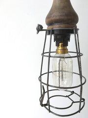 Antique wooden handle cage inspection lamp - eyespy