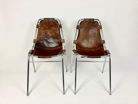 Leather chairs selected by Charlotte Perriand for Les Arcs