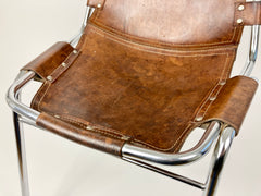 Leather chairs selected by Charlotte Perriand for Les Arcs