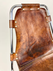 Leather chairs selected by Charlotte Perriand for Les Arcs