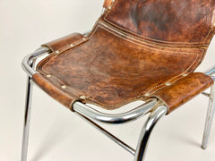 Leather chairs selected by Charlotte Perriand for Les Arcs