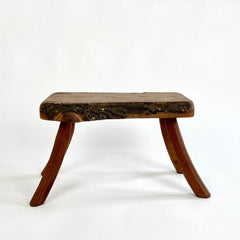 Eyespy - Mid 20th century primitive stool / side table from the Netherlands with natural live bark edge top and gently curved legs. 