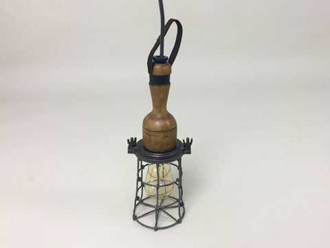 Vintage industrial caged inspection light