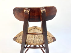 Rustic tripod chair with rush seat