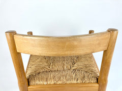 Carimate carver dining chairs by Vico Magistretti