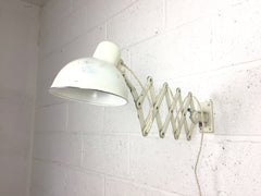 Pair of Kaiser Idell Model 6718 scissor arm wall mounted lamps - eyespy