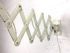Pair of Kaiser Idell Model 6718 scissor arm wall mounted lamps - eyespy