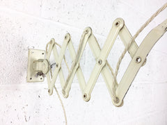 Pair of Kaiser Idell Model 6718 scissor arm wall mounted lamps - eyespy