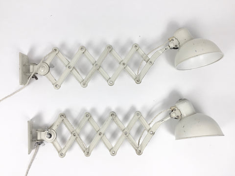 Pair of Kaiser Idell Model 6718 scissor arm wall mounted lamps