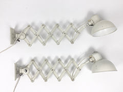 Pair of Kaiser Idell Model 6718 scissor arm wall mounted lamps - eyespy