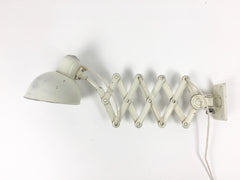 Pair of Kaiser Idell Model 6718 scissor arm wall mounted lamps - eyespy