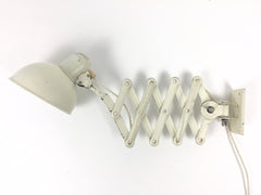 Pair of Kaiser Idell Model 6718 scissor arm wall mounted lamps - eyespy