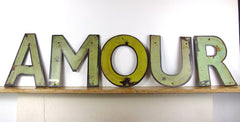 Vintage metal shop sign letters 'AMOUR' - eyespy