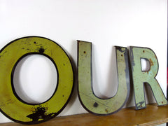 Vintage metal shop sign letters 'AMOUR' - eyespy