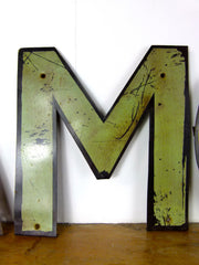 Vintage metal shop sign letters 'AMOUR' - eyespy