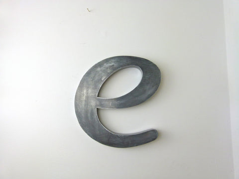 Vintage metal shop sign letter - e