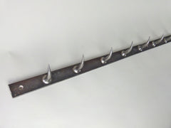 Rack of French butchers hooks - eyespy