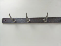 Rack of French butchers hooks - eyespy