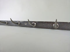Rack of French butchers hooks - eyespy