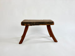 Eyespy - Mid 20th century primitive stool / side table from the Netherlands with natural live bark edge top and gently curved legs. 