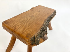 Eyespy - Mid 20th century primitive stool / side table from the Netherlands with natural live bark edge top and gently curved legs. 