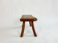 Eyespy - Mid 20th century primitive stool / side table from the Netherlands with natural live bark edge top and gently curved legs. 