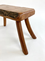 Eyespy - Mid 20th century primitive stool / side table from the Netherlands with natural live bark edge top and gently curved legs. 